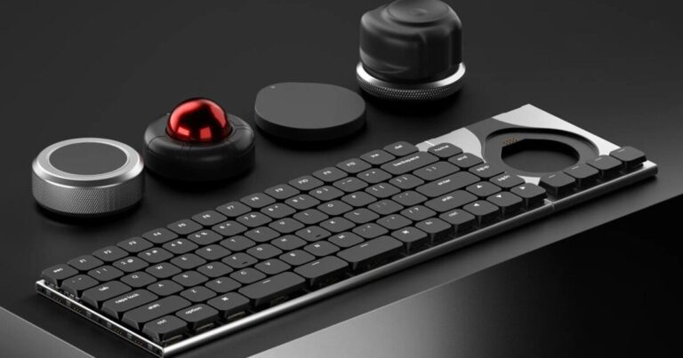 Futuristic keyboard snaps on modules for video editing, 3D modeling, and productivity